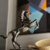 Grey metallic horse antique
