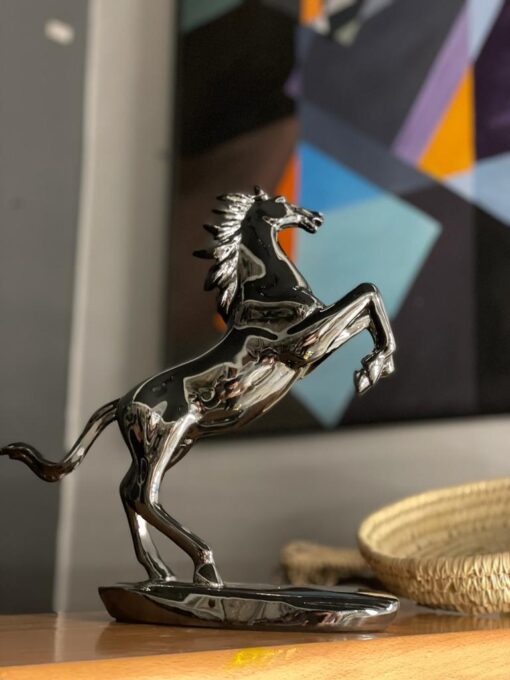 Grey metallic horse antique