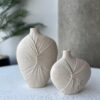0c890186 20c7 4f0e 9718 d24f9549bb23 scaled Textured Linen-Inspired Pottery Vase Duo