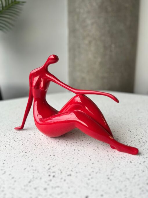Bold Red Reclining Woman Figurine
