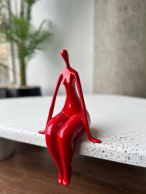 Elegant Red Sitting Woman Figurine
