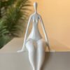 Ivory Calm: Seated Abstract Figure